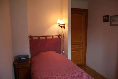 Un ou plusieurs lits dans un hébergement de l'établissement Chambre d'hôtes à Vecoux
