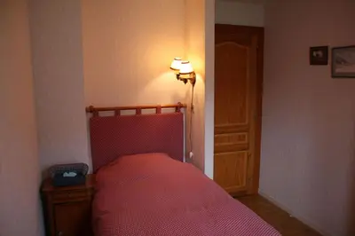 Un ou plusieurs lits dans un hébergement de l'établissement Chambre d'hôtes à Vecoux