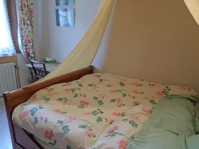 Un ou plusieurs lits dans un hébergement de l'établissement Chambre d'hôtes à Vecoux