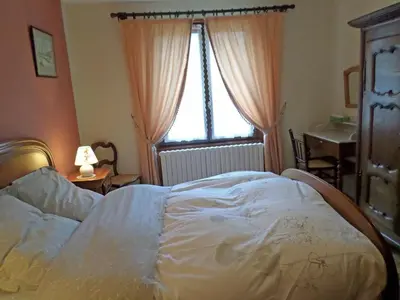 Un ou plusieurs lits dans un hébergement de l'établissement Chambre d'hôtes à Vecoux