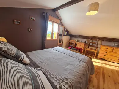 Un ou plusieurs lits dans un hébergement de l'établissement La Maison d'hôtes La Fesnel
