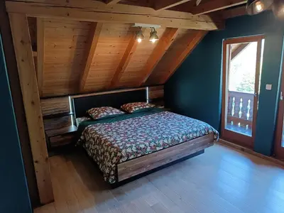 Un ou plusieurs lits dans un hébergement de l'établissement Maison nature et calme - 3 chambres - Vue montagne