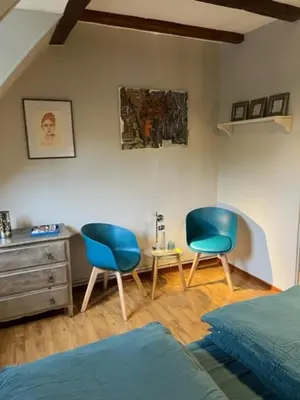 Coin salon dans l'établissement Chambre d'hôte chez Hélène
