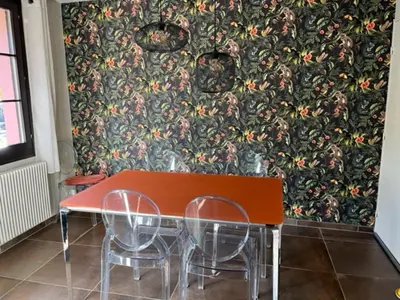 Coin salon dans l'établissement Chambre d'hôte chez Hélène