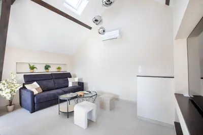 Coin salon dans l'établissement Gîte de Charme avec Spa - Design Moderne