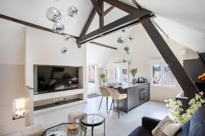 Télévision ou salle de divertissement dans l'établissement Gîte de Charme avec Spa - Design Moderne