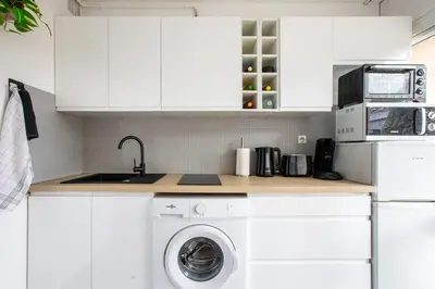 Cuisine ou kitchenette dans l'établissement L'Eden Appart, Fibre, Garage, Balcon, Calme et Cosy