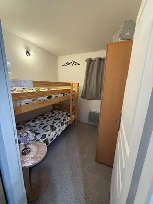 Un ou plusieurs lits dans un hébergement de l'établissement Appartement vu exceptionnel sur le lac 2