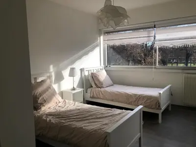 Un ou plusieurs lits dans un hébergement de l'établissement Appartement moderne esprit loft avec balcon centre Colmar proche gare et Place Rapp