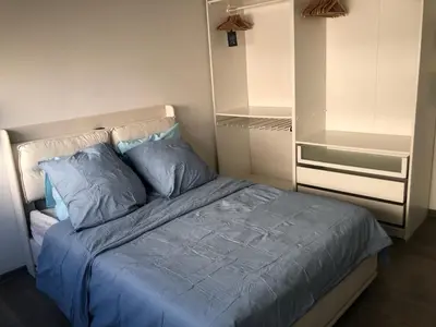 Un ou plusieurs lits dans un hébergement de l'établissement Appartement moderne esprit loft avec balcon centre Colmar proche gare et Place Rapp