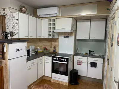 Cuisine ou kitchenette dans l'établissement atelier couture