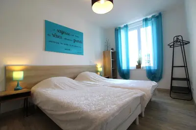 Un ou plusieurs lits dans un hébergement de l'établissement Gîte Millésime à Gérardmer Emplacement idéal tout