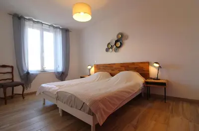 Un ou plusieurs lits dans un hébergement de l'établissement Gîte Millésime à Gérardmer Emplacement idéal tout