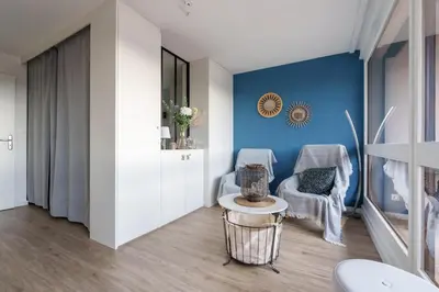 Coin salon dans l'établissement La Résidence Le Belvédère - Avec Balcon