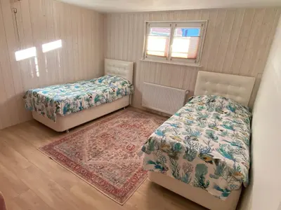 Un ou plusieurs lits dans un hébergement de l'établissement Cozy ground floor apartment