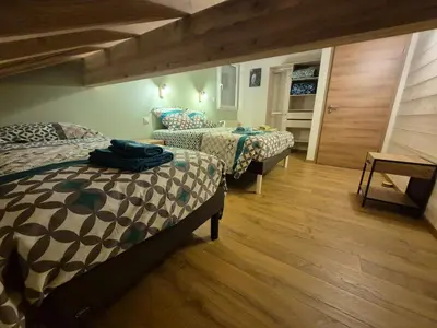 Un ou plusieurs lits dans un hébergement de l'établissement Maison Gite Le Randonneur
