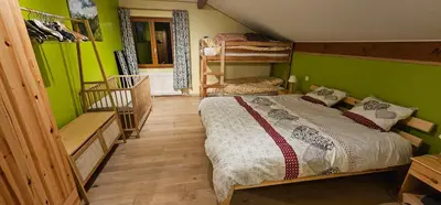 Un ou plusieurs lits dans un hébergement de l'établissement La ferme rose