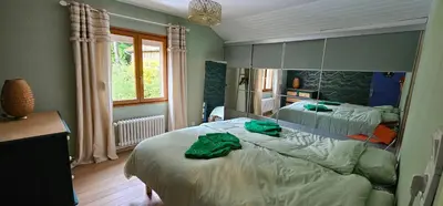 Un ou plusieurs lits dans un hébergement de l'établissement La ferme rose