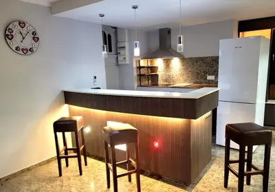 Cuisine ou kitchenette dans l'établissement La Friandise