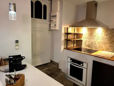 Cuisine ou kitchenette dans l'établissement La Friandise