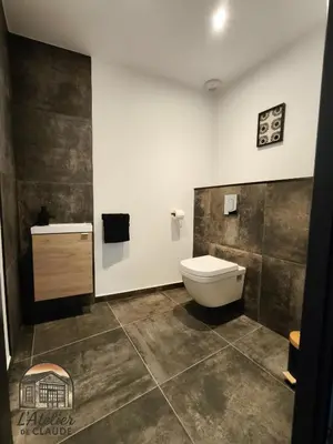 Salle de bains dans l'établissement L'Atelier de Claude