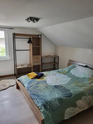 Un ou plusieurs lits dans un hébergement de l'établissement Maison - terrasse - piscine