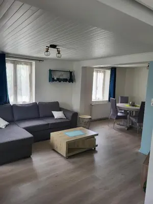 Coin salon dans l'établissement Maison - terrasse - piscine