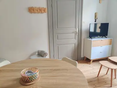 Télévision ou salle de divertissement dans l'établissement La lueur boréale