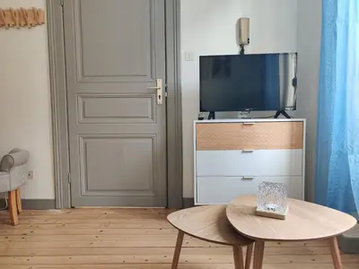 Télévision ou salle de divertissement dans l'établissement La lueur boréale