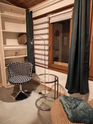 Coin salon dans l'établissement La chambre d'hôtes du facteur d'orgues