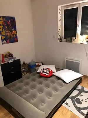 Un ou plusieurs lits dans un hébergement de l'établissement Chambre proche Colmar