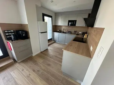 Cuisine ou kitchenette dans l'établissement L'Écrin Ludovicien - Chambres design & Spa