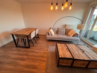 Coin salon dans l'établissement L'appartement du Château