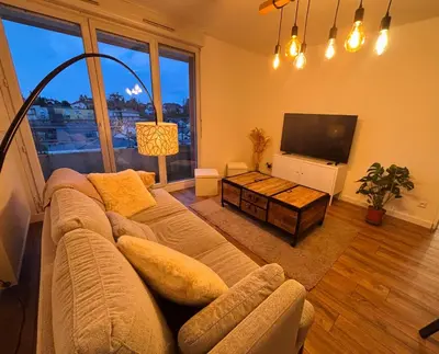 Coin salon dans l'établissement L'appartement du Château