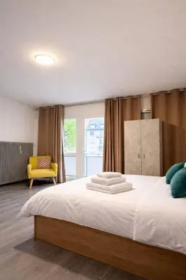 Un ou plusieurs lits dans un hébergement de l'établissement Studio Premium Hyper-Centre, Parking Gratuit, Aux Portes de Bâle