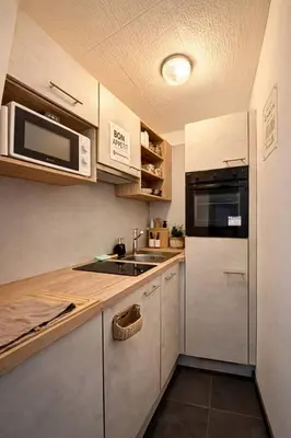Cuisine ou kitchenette dans l'établissement Studio Premium Hyper-Centre, Parking Gratuit, Aux Portes de Bâle