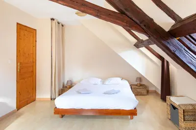 Un ou plusieurs lits dans un hébergement de l'établissement Grande maison familiale à Kaysersberg-Vignoble