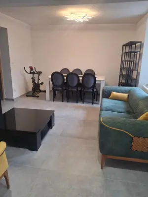 Coin salon dans l'établissement Appartement T3 conviviale avec terrasse
