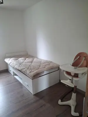 Un ou plusieurs lits dans un hébergement de l'établissement Appartement T3 conviviale avec terrasse