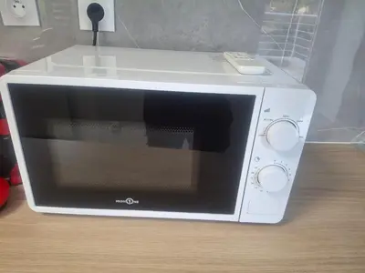 Cuisine ou kitchenette dans l'établissement Appartement T3 conviviale avec terrasse