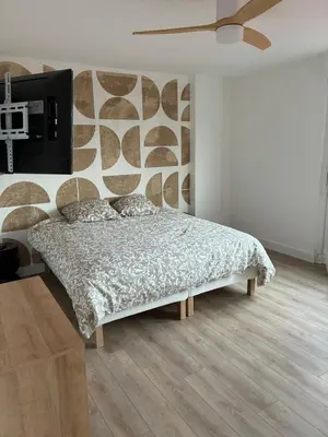 Un ou plusieurs lits dans un hébergement de l'établissement Chez nous Mulhouse - Hyper Centre - Parking - Balcon - Netflix