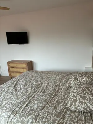 Un ou plusieurs lits dans un hébergement de l'établissement Chez nous Mulhouse - Hyper Centre - Parking - Balcon - Netflix