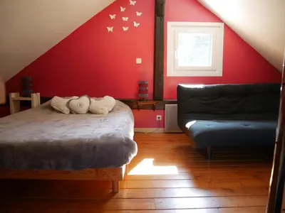 Un ou plusieurs lits dans un hébergement de l'établissement Chalet pour amoureux de la nature avec vue sur le lac de Retournemer