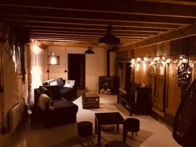 Coin salon dans l'établissement Ferme vosgienne cosy