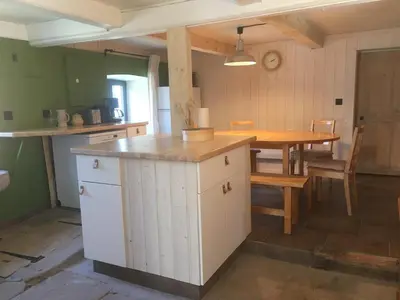 Cuisine ou kitchenette dans l'établissement Ferme vosgienne cosy