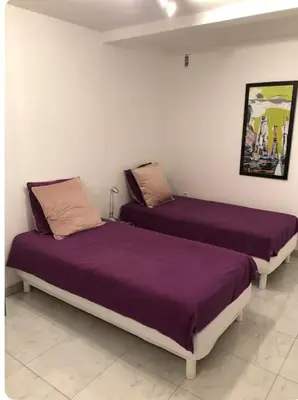 Un ou plusieurs lits dans un hébergement de l'établissement Studio cosy proche Colmar