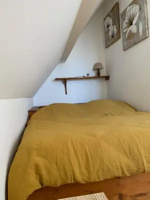 Un ou plusieurs lits dans un hébergement de l'établissement Gîte Dreiviertelacker