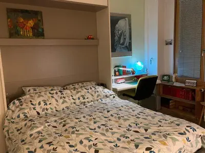 Un ou plusieurs lits dans un hébergement de l'établissement Appartement Les Tulipes