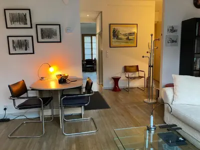 Coin salon dans l'établissement Appartement Les Tulipes