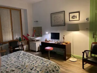 Un ou plusieurs lits dans un hébergement de l'établissement Appartement Les Tulipes